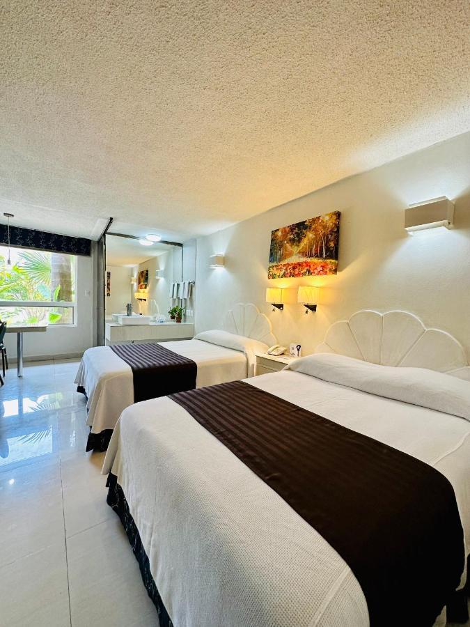 Hotel Plaza Caribe Cancun Bagian luar foto